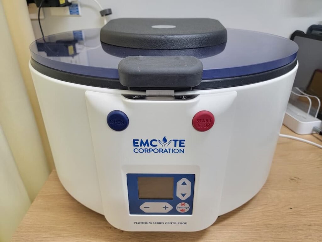 Centrifuge machine from EMCYTE Corporation, used for PRP treatments in aesthetic medicine, emphasizing skin rejuvenation and healing.